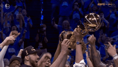 Basketball Players Holding Trophy GIF