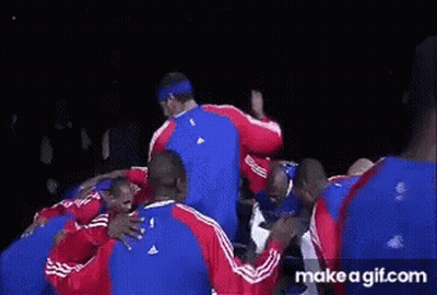 Basketball Players Huddled With Number 24 GIF