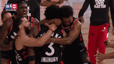 Basketball Players Hugging Number 3 GIF