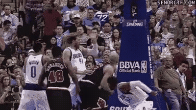 Basketball Players In Front Of Stadium Crowd GIF