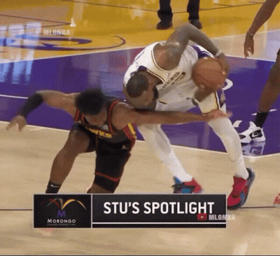 Basketball Players In Front Of Stu's Spotlight Sign GIF