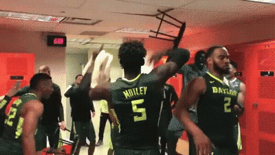 Basketball Players In Locker Room With Number 5 GIF
