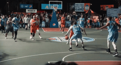Basketball Players On A Court With A Sign That Says Make A Move Bring Your Game In The Background GIF