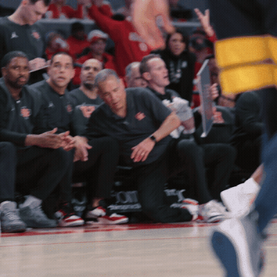 Basketball Players On Bench With UCLA Shirt GIF