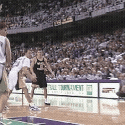 Basketball Players On Court With ESPN Ads GIF