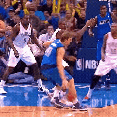 Basketball Players On Court With NBA Logo GIF