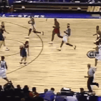 Basketball Players On Court With NBA Logo GIF