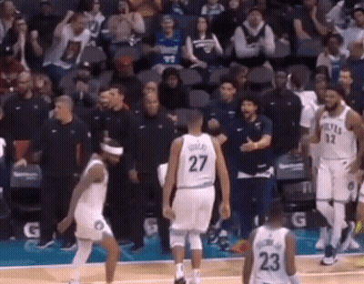 Basketball Players On Court With Number 27 Jersey GIF