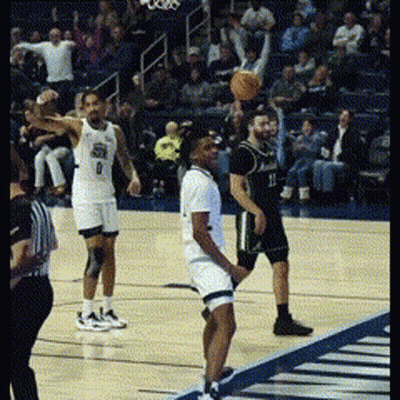 Basketball Players On Court With Number 9 GIF