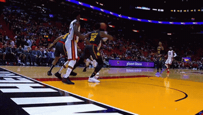 Basketball Players Playing Before Crowd GIF