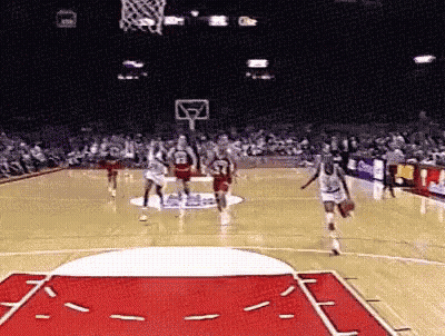 Basketball Players Playing Game With Crowd Watching GIF