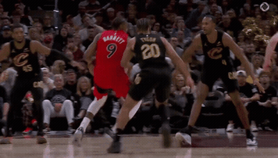 Basketball Players Playing In Front Of Crowd GIF