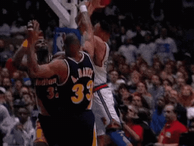 Basketball Players Playing In Front Of Crowd GIF
