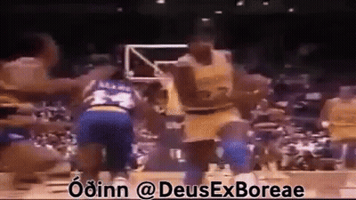 Basketball Players Playing In Front Of Crowd GIF