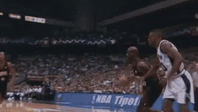 Basketball Players Playing In Stadium GIF