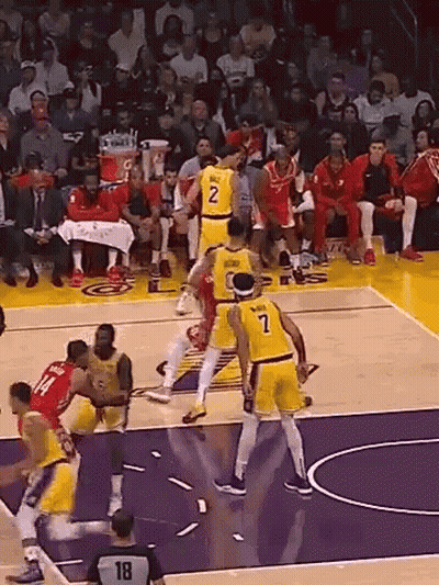 Basketball Players Playing With Referee Number 18 GIF