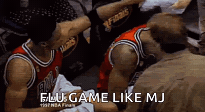 Basketball Players Sitting In Locker Room One Holding Ball GIF