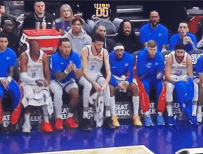 Basketball Players Sitting On Bench GIF
