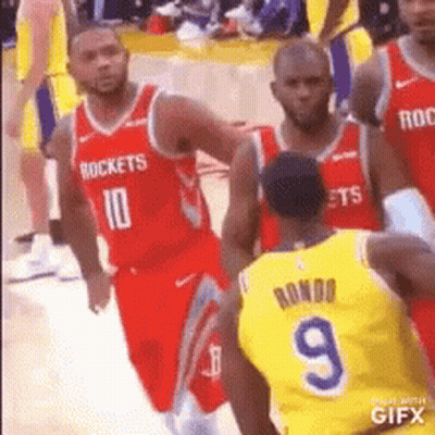 Basketball Players Standing On Court GIF
