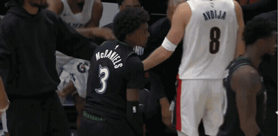 Basketball Players Standing On Court Number 11 GIF