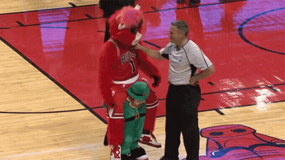 Basketball Referee Talks To Bulls Mascot GIF