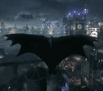 Bat Flying Over City Night Getham Hotel Sign GIF