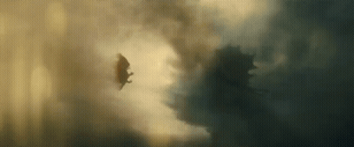 Bat Flying Through Cloudy Sky With Monster GIF