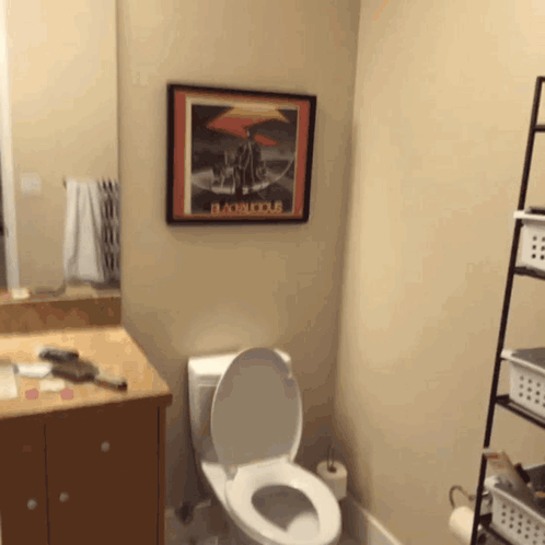 Bathroom With Bacchus Picture Above Toilet GIF