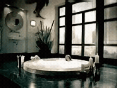 Bathroom With Jacuzzi Tub And Candles GIF