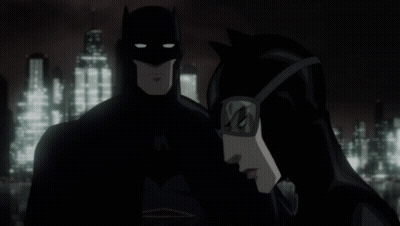 Batman And Catwoman Are Standing Next To Each Other In Front Of A City Skyline GIF