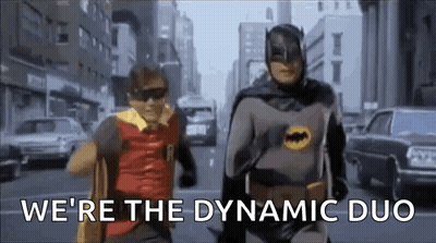 Batman And Robin Are Running Down The Street In A Dynamic Duo . GIF