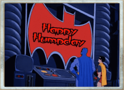 Batman And Robin Standing In Front Of Happy Humpday Sign GIF