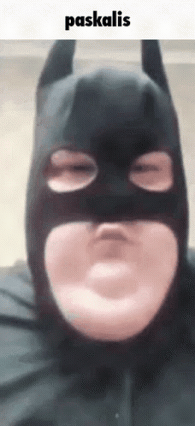 Batman Costume Making Funny Face Eyes Closed GIF