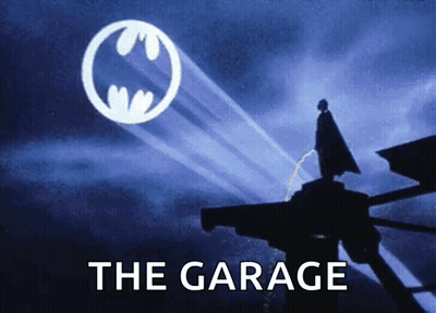 Batman Logo Poster Saying The Garage GIF