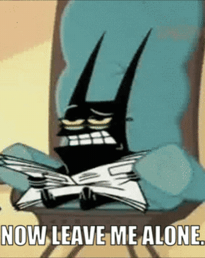 Batman Sitting Reading Book Saying Now Leave Me Alone GIF