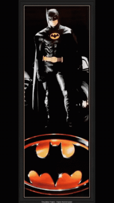 Batman Standing in Front of Bat Symbol