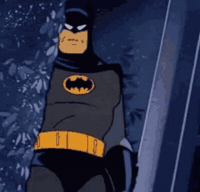 Batman Standing In Front Of Building GIF