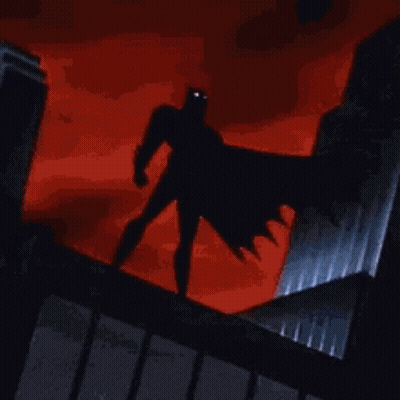 Batman Standing On Building Edge GIF