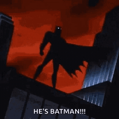 Batman Standing On Building Saying He's Batman GIF