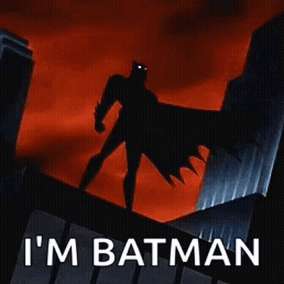 Batman Standing On Building Saying I'm Batman GIF