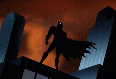 Batman Standing on Building With Lightning Bolt