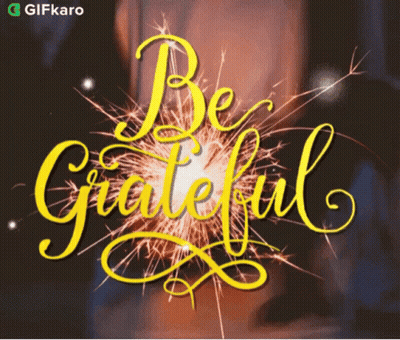 Be Grateful Sign With Sparklers GIF