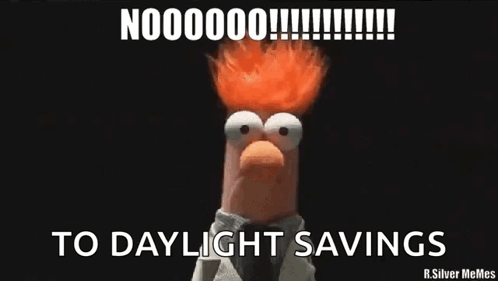 Beaker From The Muppet Show Is Making A Funny Face While Holding His Hands Up In The Air . GIF