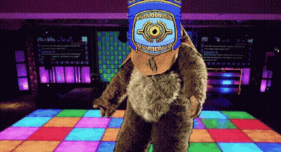 Bear Mascot Standing On Dance Floor GIF