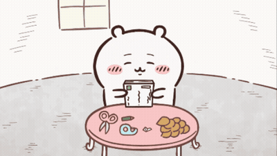 Bear Sitting At Table Holding Box GIF