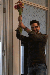 Beard Man Giving Flowers GIF