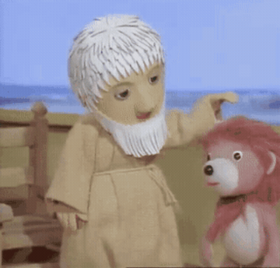 Bearded Cartoon Character And Pink Teddy Bear GIF