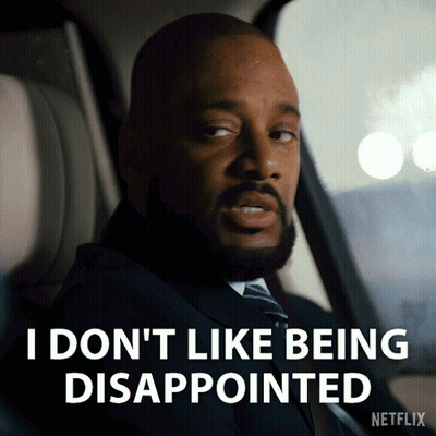 Bearded Cartoon Character In Suit And Tie GIF