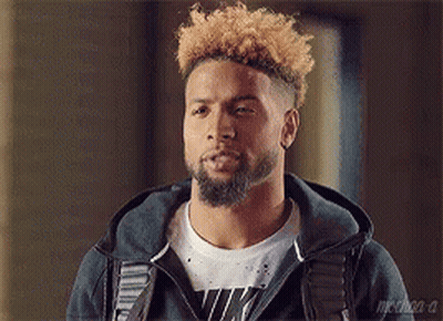 Bearded Curly Haired Man In Hoodie And White Shirt GIF