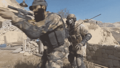 Bearded Gunman And Skull-Headed Rifleman GIF